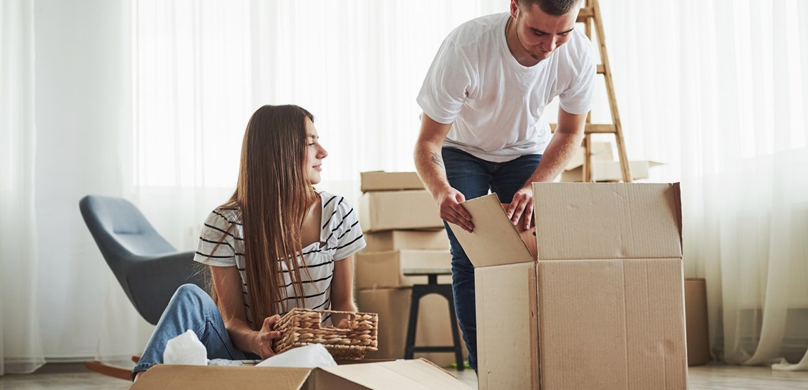 Couple with moving boxes