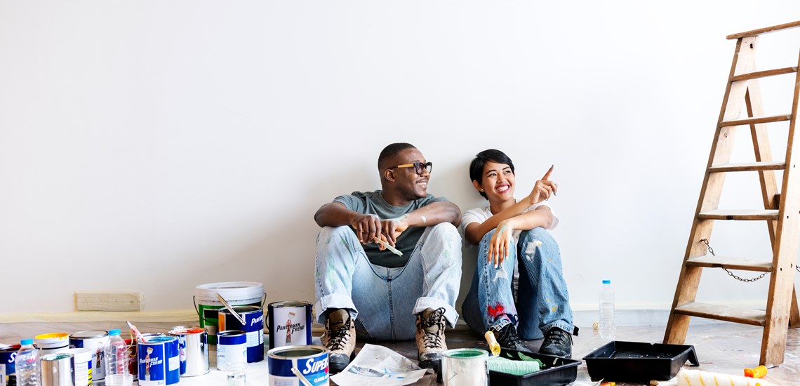 Couple redecorating buy to let house