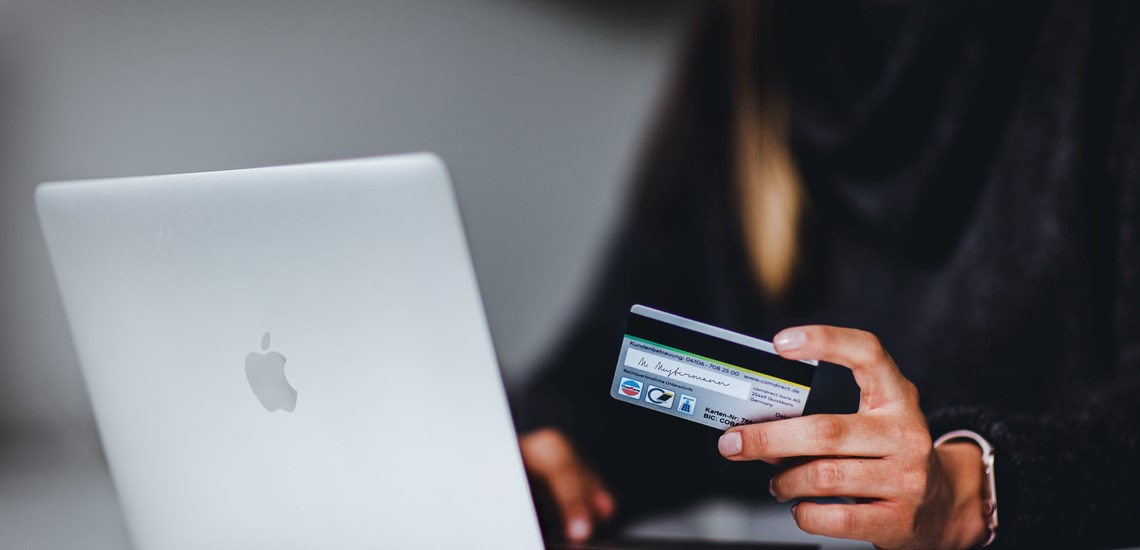 Using credit card on laptop