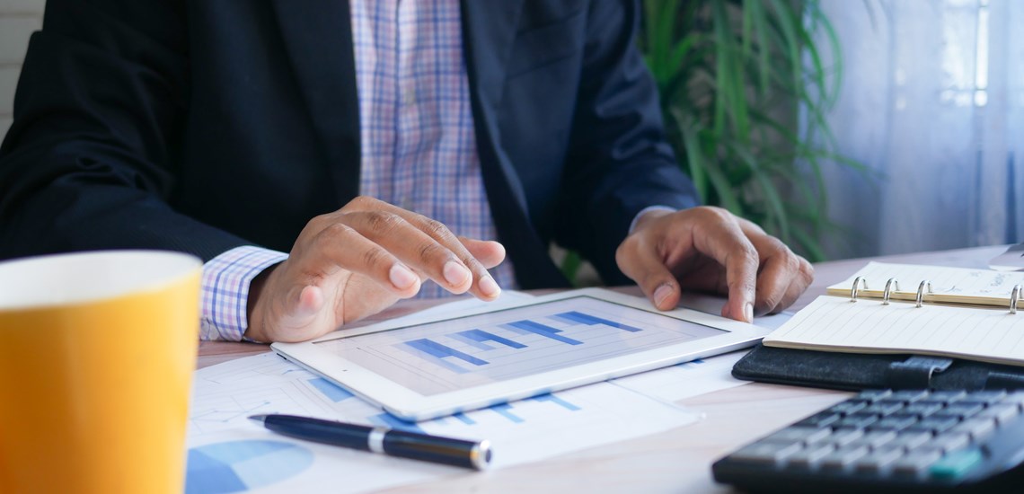 man-looking-at-finance-documents